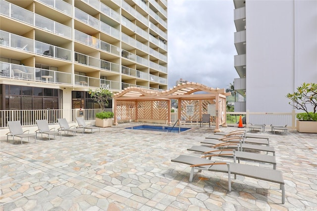 445 Seaside Ave Unit 3316, Honolulu, HI 96815 - view of swimming pool featuring a pergola and a patio