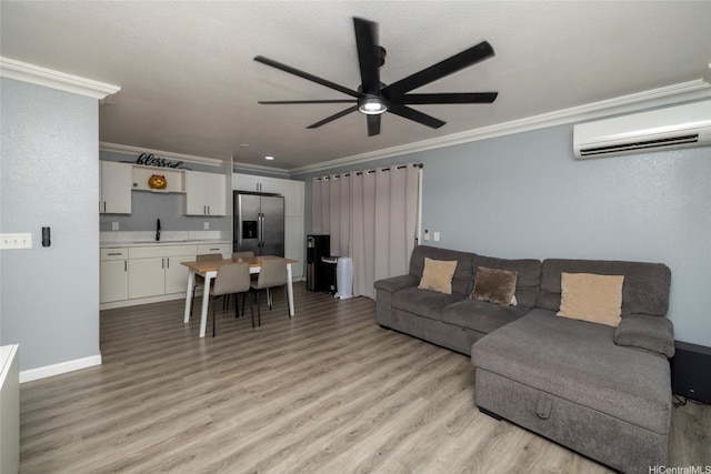 91-1097 Namahoe St Unit 4D, Kapolei, HI 96707 - living room featuring crown molding, an AC wall unit, a ceiling fan, and light wood finished floors
