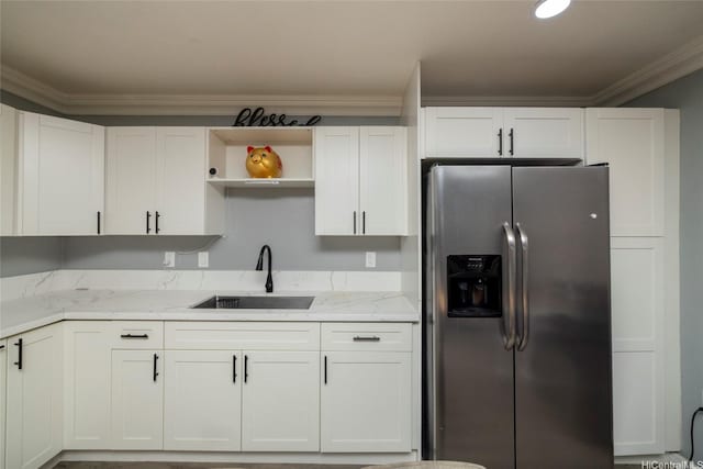91-1097 Namahoe St Unit 4D, Kapolei, HI 96707 - kitchen with stainless steel refrigerator with ice dispenser, open shelves, ornamental molding, white cabinetry, and light stone counters