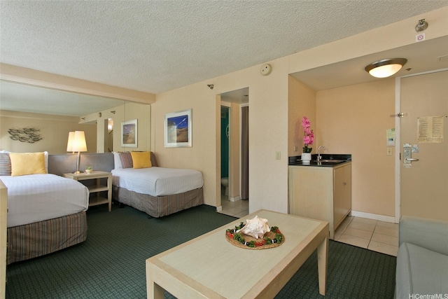 444 Kanekapolei St Unit 705, Honolulu, HI 96815 - bedroom with light tile patterned floors and a textured ceiling