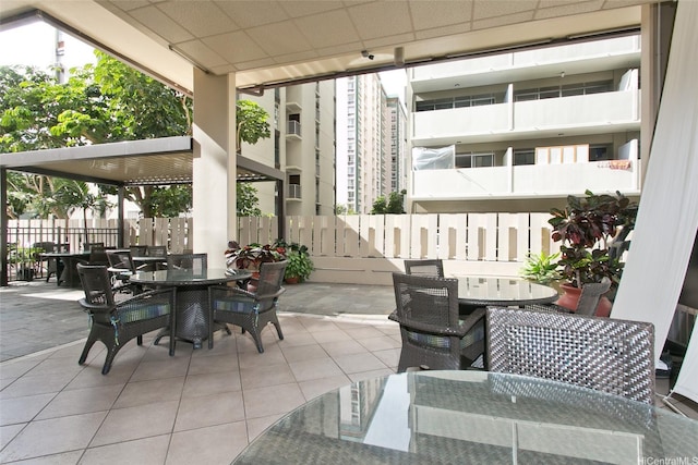444 Kanekapolei St Unit 705, Honolulu, HI 96815 - view of patio / terrace with outdoor dining space