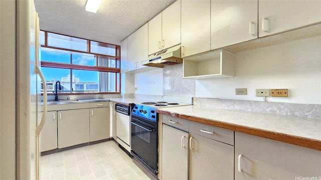 1310 Heulu St Unit 301, Honolulu, HI 96822 - kitchen with white appliances, under cabinet range hood, light countertops, and a textured ceiling