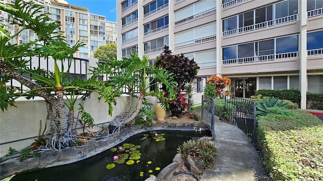 1310 Heulu St Unit 301, Honolulu, HI 96822 - view of home's community featuring a small pond