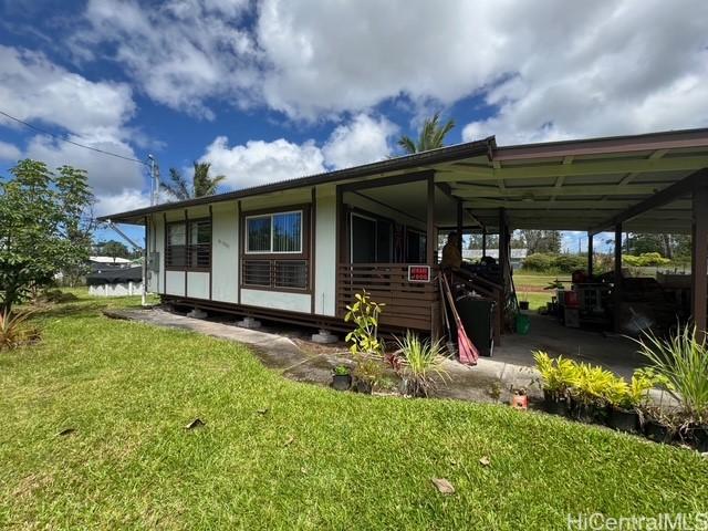 16-2033 Hibiscus Dr, Pahoa, HI 96778 - back of house featuring a yard