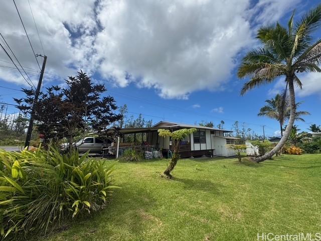 16-2033 Hibiscus Dr, Pahoa, HI 96778 - view of front of property with a front lawn