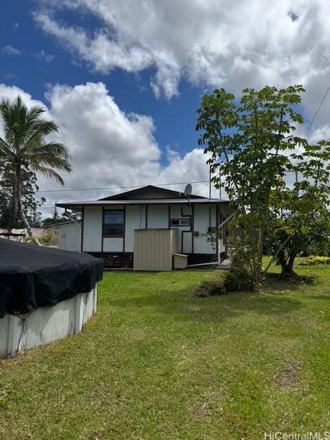 16-2033 Hibiscus Dr, Pahoa, HI 96778 - back of property with a lawn