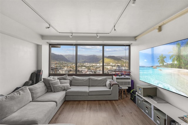 2333 Kapiolani Blvd Unit 3202, Honolulu, HI 96826 - living area with rail lighting and light wood-style floors