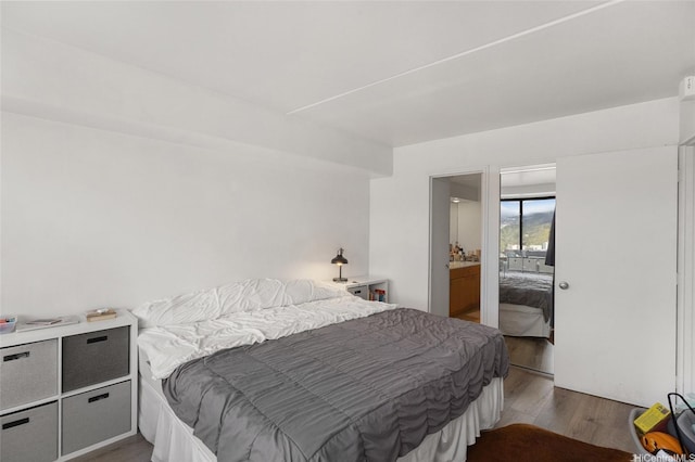2333 Kapiolani Blvd Unit 3202, Honolulu, HI 96826 - bedroom featuring wood finished floors