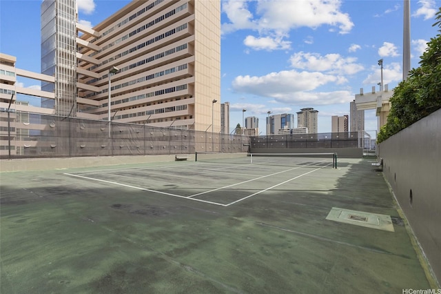 2333 Kapiolani Blvd Unit 3202, Honolulu, HI 96826 - view of tennis court with a view of skyline