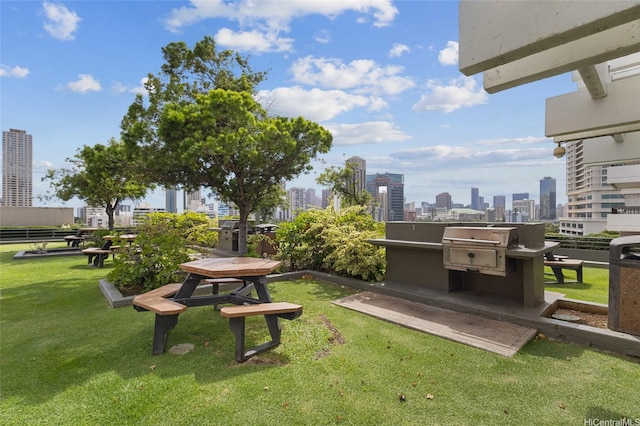 2333 Kapiolani Blvd Unit 3202, Honolulu, HI 96826 - view of home's community featuring a view of skyline and a yard