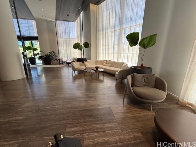 1000 Auahi St Unit 403, Honolulu, HI 96814 - common area featuring a high ceiling and a wall of windows
