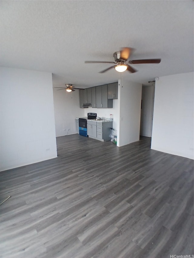 750 Kanoa St Unit 305, Honolulu, HI 96817 - unfurnished living room with ceiling fan and dark wood-style floors