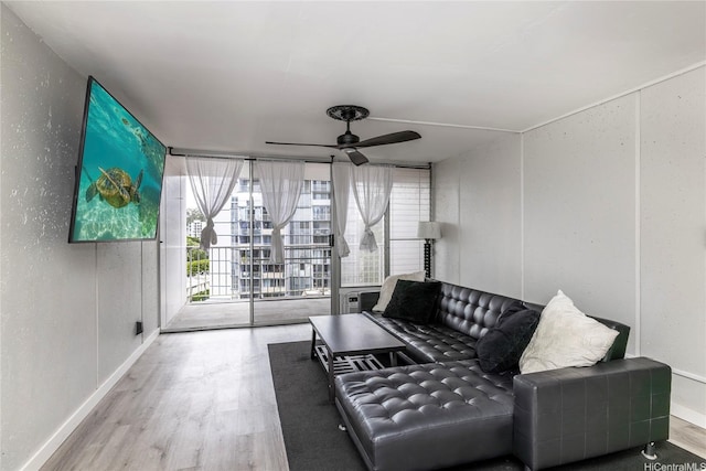 95-20 Waihonu St Unit C805, Mililani, HI 96789 - sitting room with ceiling fan and wood finished floors