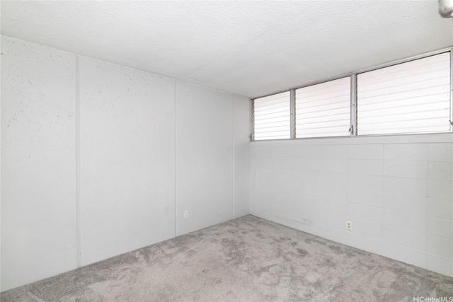 95-20 Waihonu St Unit C805, Mililani, HI 96789 - spare room featuring carpet floors and a textured ceiling