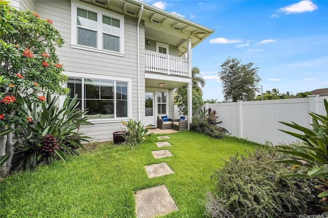 91-2220 Kaiwawalo St Unit 1001, Ewa Beach, HI 96706 - rear view of property featuring a balcony