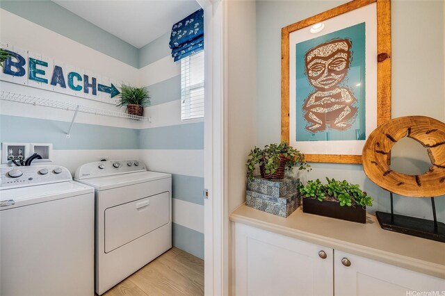 91-2220 Kaiwawalo St Unit 1001, Ewa Beach, HI 96706 - laundry area featuring independent washer and dryer and light wood finished floors