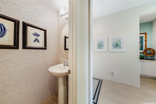 91-2220 Kaiwawalo St Unit 1001, Ewa Beach, HI 96706 - bathroom with wood finished floors and a sink