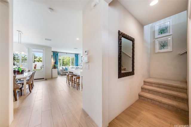 91-2220 Kaiwawalo St Unit 1001, Ewa Beach, HI 96706 - corridor featuring light wood finished floors, recessed lighting, and stairway