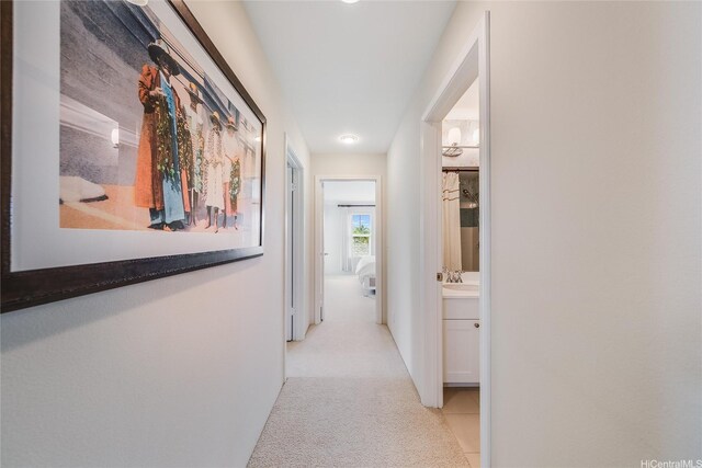 91-2220 Kaiwawalo St Unit 1001, Ewa Beach, HI 96706 - hallway featuring light colored carpet