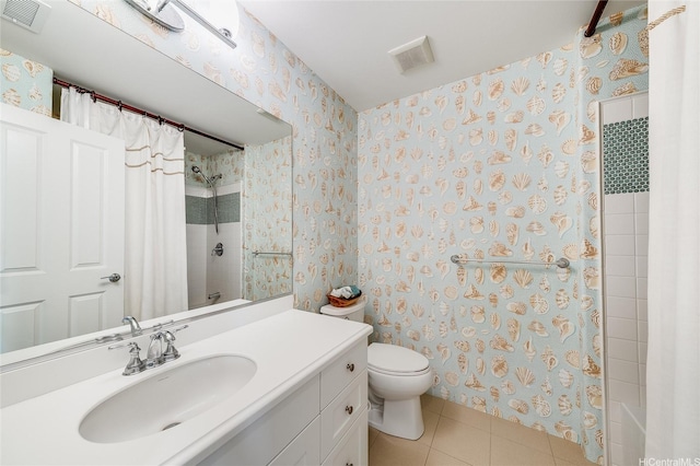 91-2220 Kaiwawalo St Unit 1001, Ewa Beach, HI 96706 - full bath with wallpapered walls, vanity, tile patterned flooring, and shower / bath combo
