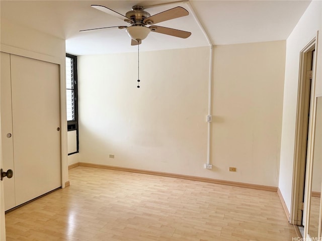 511 Hahaione St Unit 1-7C, Honolulu, HI 96825 - unfurnished bedroom featuring light wood-type flooring, ceiling fan, and a closet