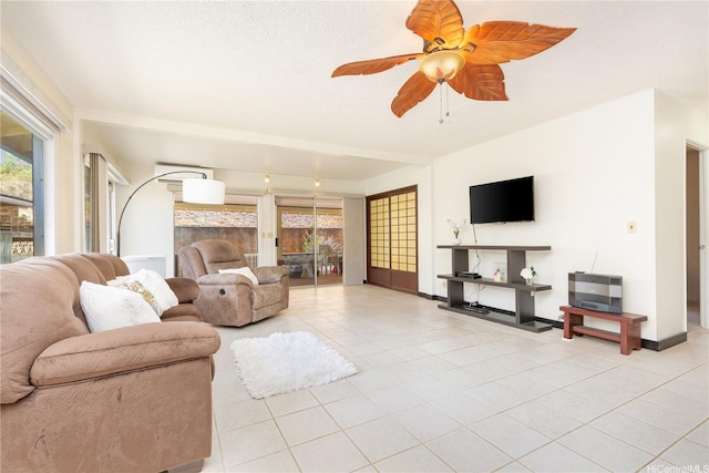 94-444 Alapine St, Waipahu, HI 96797 - tiled living area with a ceiling fan and baseboards