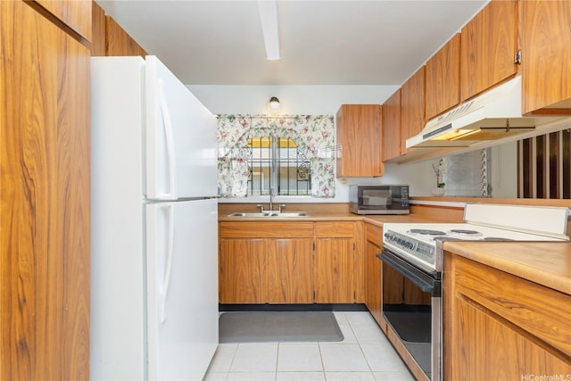 94-444 Alapine St, Waipahu, HI 96797 - kitchen featuring white appliances, light tile patterned floors, under cabinet range hood, light countertops, and brown cabinetry