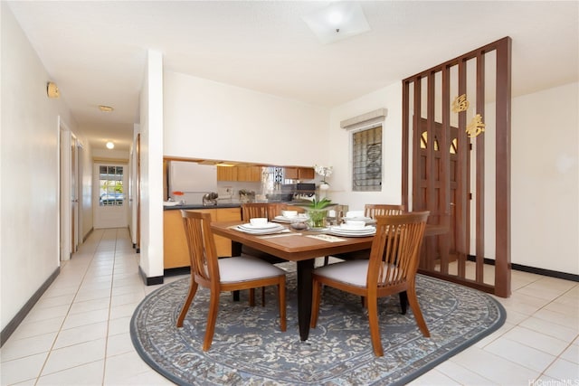 94-444 Alapine St, Waipahu, HI 96797 - dining room with light tile patterned floors and baseboards