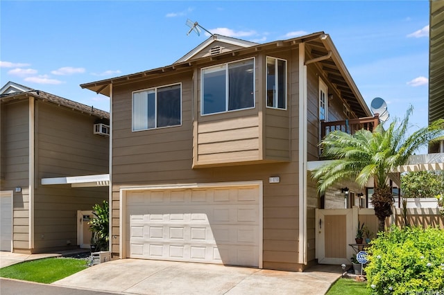 91-1026B Hoomaka St Unit 35, Ewa Beach, HI 96706 - view of front of property with a garage, concrete driveway, and a balcony