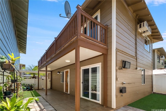 91-1026B Hoomaka St Unit 35, Ewa Beach, HI 96706 - view of home's exterior with a balcony and a patio area