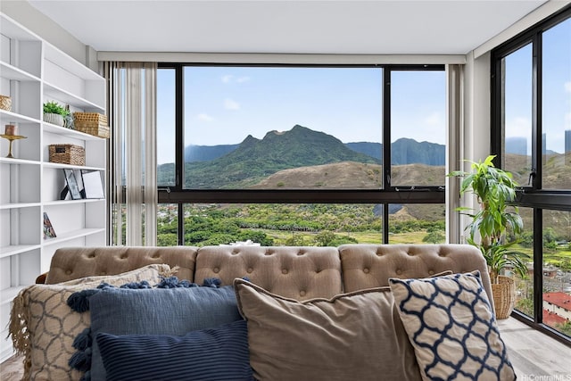 322 Aoloa St Unit 1708, Kailua, HI 96734 - sitting room with a mountain view, expansive windows, and wood finished floors