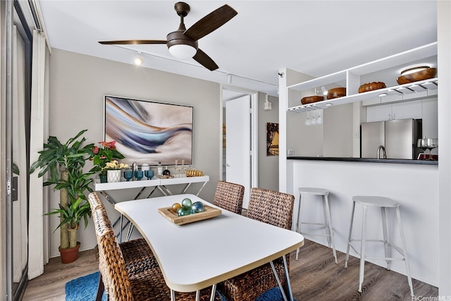 322 Aoloa St Unit 1708, Kailua, HI 96734 - dining space featuring wood finished floors and a ceiling fan