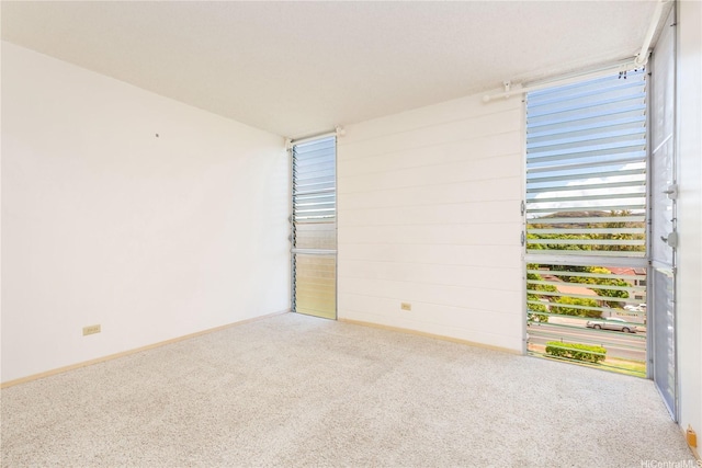 3030 Ala Ilima St Unit 402, Honolulu, HI 96818 - empty room with carpet and baseboards
