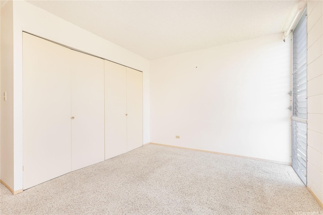 3030 Ala Ilima St Unit 402, Honolulu, HI 96818 - unfurnished bedroom with carpet flooring and a closet