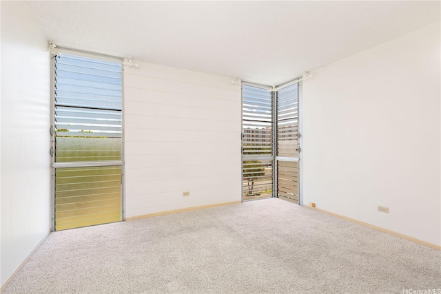 3030 Ala Ilima St Unit 402, Honolulu, HI 96818 - carpeted empty room featuring baseboards