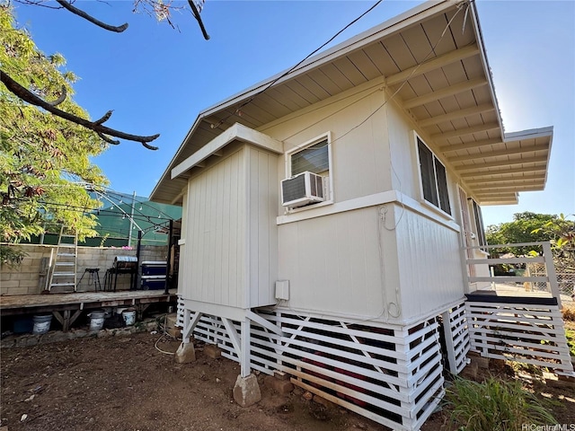 87-1894 Mohihi St, Waianae, HI 96792 - view of side of home featuring a deck and cooling unit