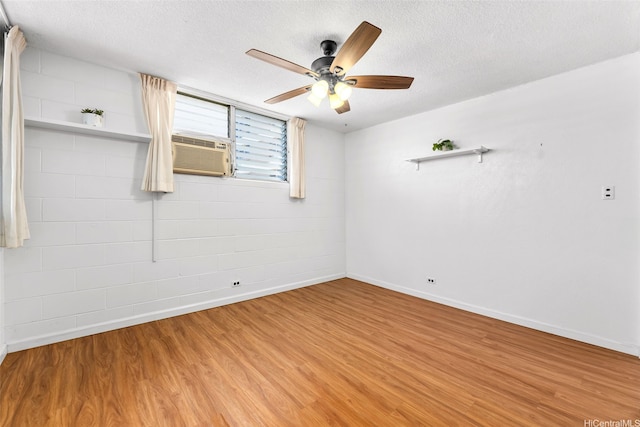 1210 Wilder Ave Unit 305, Honolulu, HI 96822 - unfurnished room with light wood-type flooring, a ceiling fan, and a textured ceiling