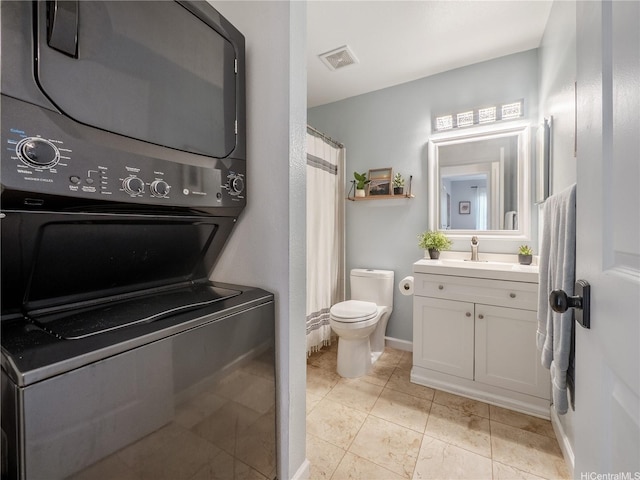 95-524 Wikao St Unit A101, Mililani, HI 96789 - full bath with stacked washer and clothes dryer and vanity