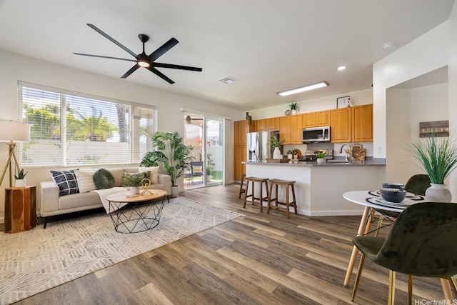 91-1221 Kanela St Unit M54, Ewa Beach, HI 96706 - living room featuring wood finished floors, a ceiling fan, and recessed lighting