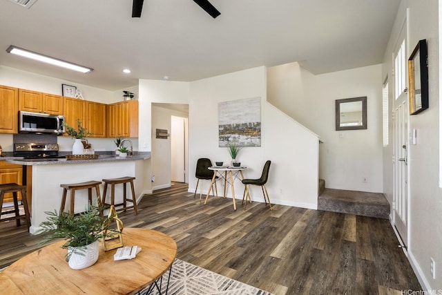 91-1221 Kanela St Unit M54, Ewa Beach, HI 96706 - living room featuring dark wood-style flooring, recessed lighting, and a ceiling fan
