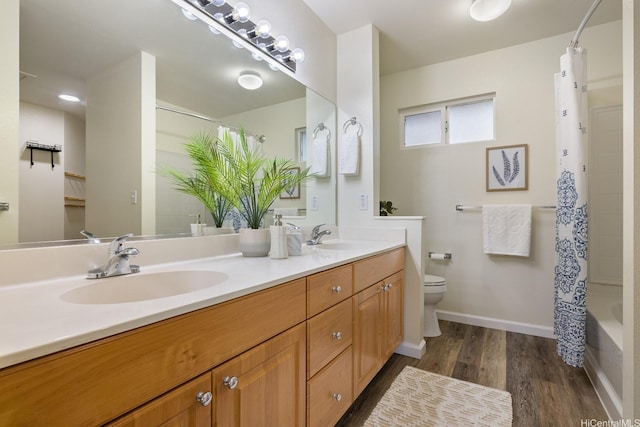 91-1221 Kanela St Unit M54, Ewa Beach, HI 96706 - bathroom featuring double vanity, wood finished floors, and shower / bath combo with shower curtain