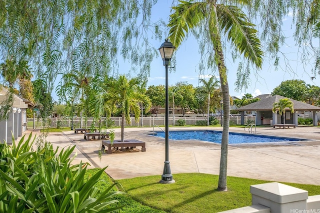91-1221 Kanela St Unit M54, Ewa Beach, HI 96706 - view of swimming pool with a patio area