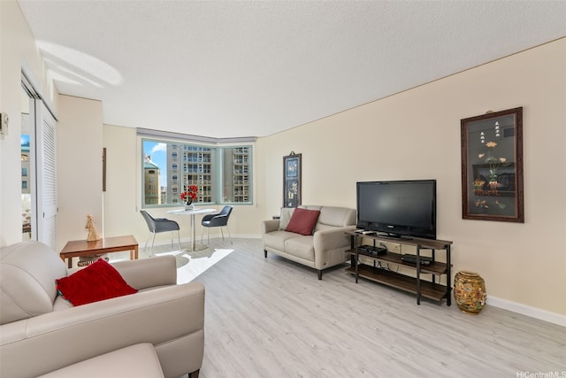 1314 Kalakaua Ave Unit 1407, Honolulu, HI 96826 - living room with wood finished floors and baseboards