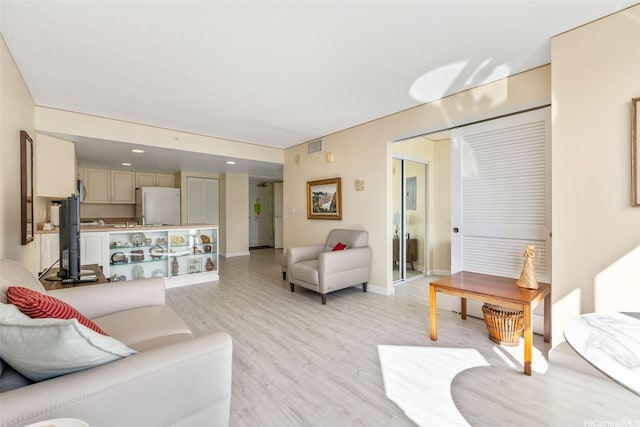 1314 Kalakaua Ave Unit 1407, Honolulu, HI 96826 - living area featuring light wood finished floors and baseboards