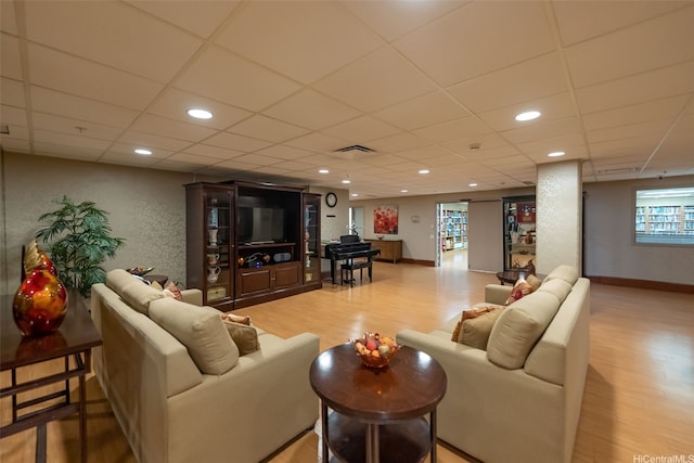 1314 Kalakaua Ave Unit 1407, Honolulu, HI 96826 - living area featuring wood finished floors, a drop ceiling, and recessed lighting