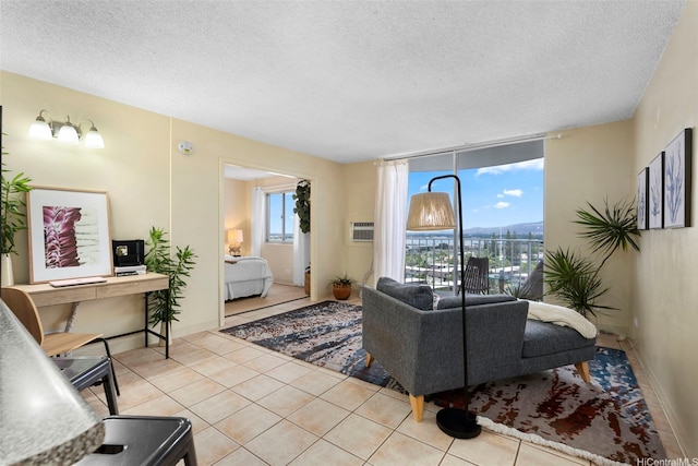 98-1038 Moanalua Rd Unit 1502, Aiea, HI 96701 - living area featuring a textured ceiling, light tile patterned flooring, and a wall mounted air conditioner