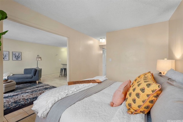 98-1038 Moanalua Rd Unit 1502, Aiea, HI 96701 - tiled bedroom with a textured ceiling