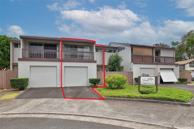 95-45 Hokuiwa St Unit 22, Mililani, HI 96789 - multi unit property with an attached garage, driveway, and stucco siding