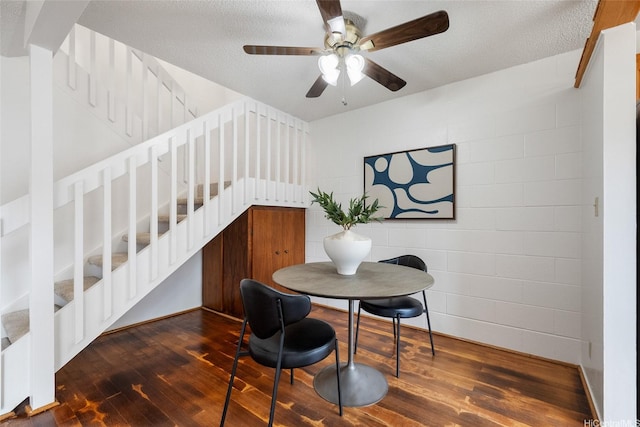 95-45 Hokuiwa St Unit 22, Mililani, HI 96789 - dining space with wood finished floors, stairs, ceiling fan, and a textured ceiling