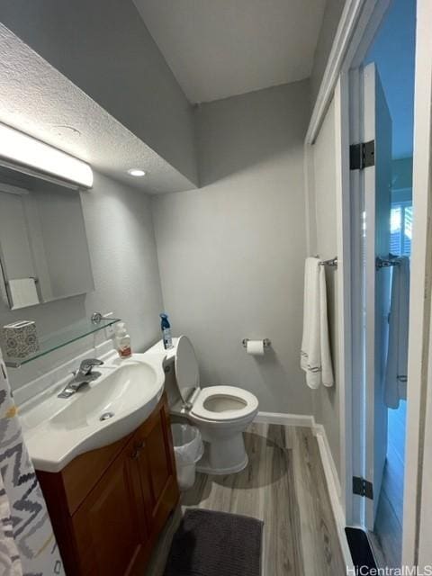 2450 Koa Ave Unit 35, Honolulu, HI 96815 - bathroom featuring wood finished floors and vanity